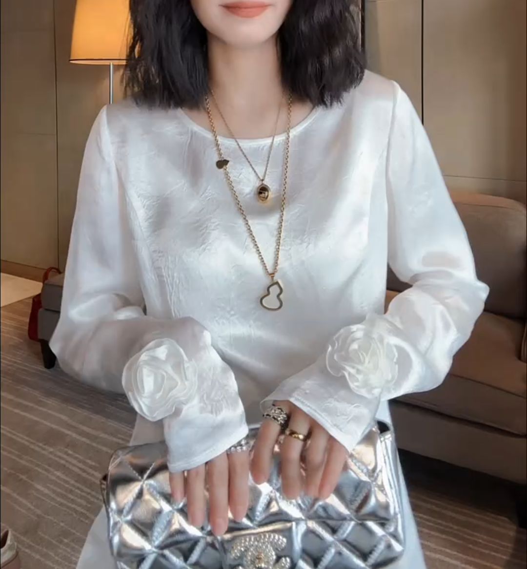 Three-dimensional floral shiny top with cuffs