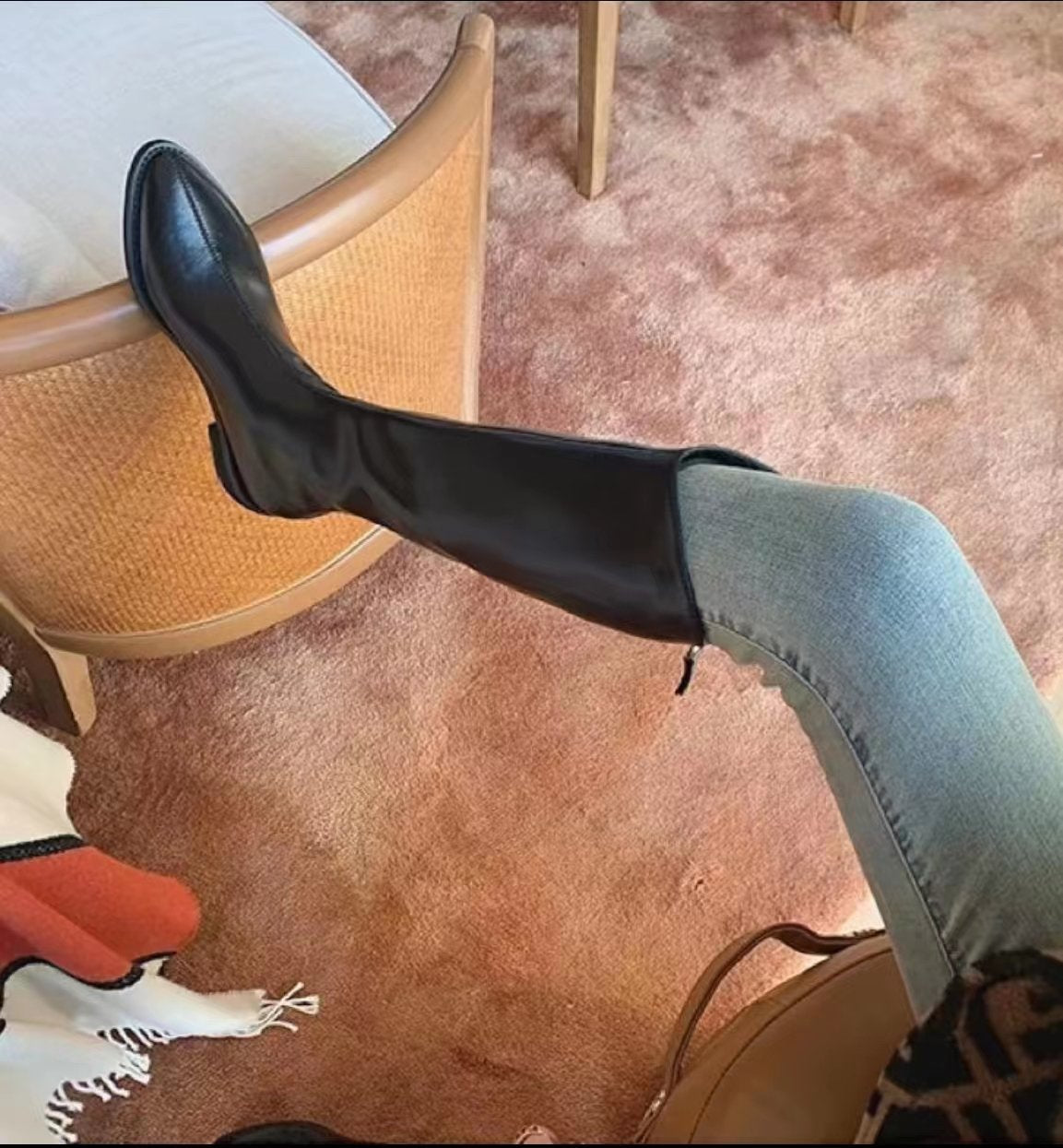 Simple high-top boots that go below the knee