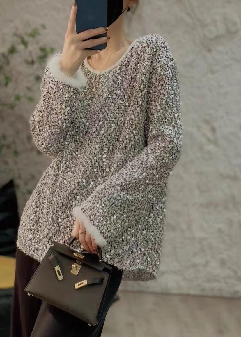 Women's furry top with sequin cuffs
