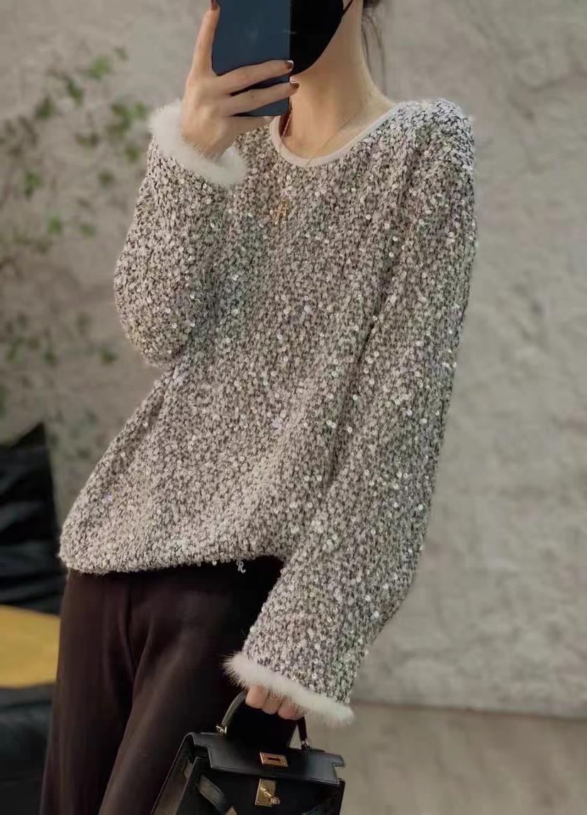 Women's furry top with sequin cuffs