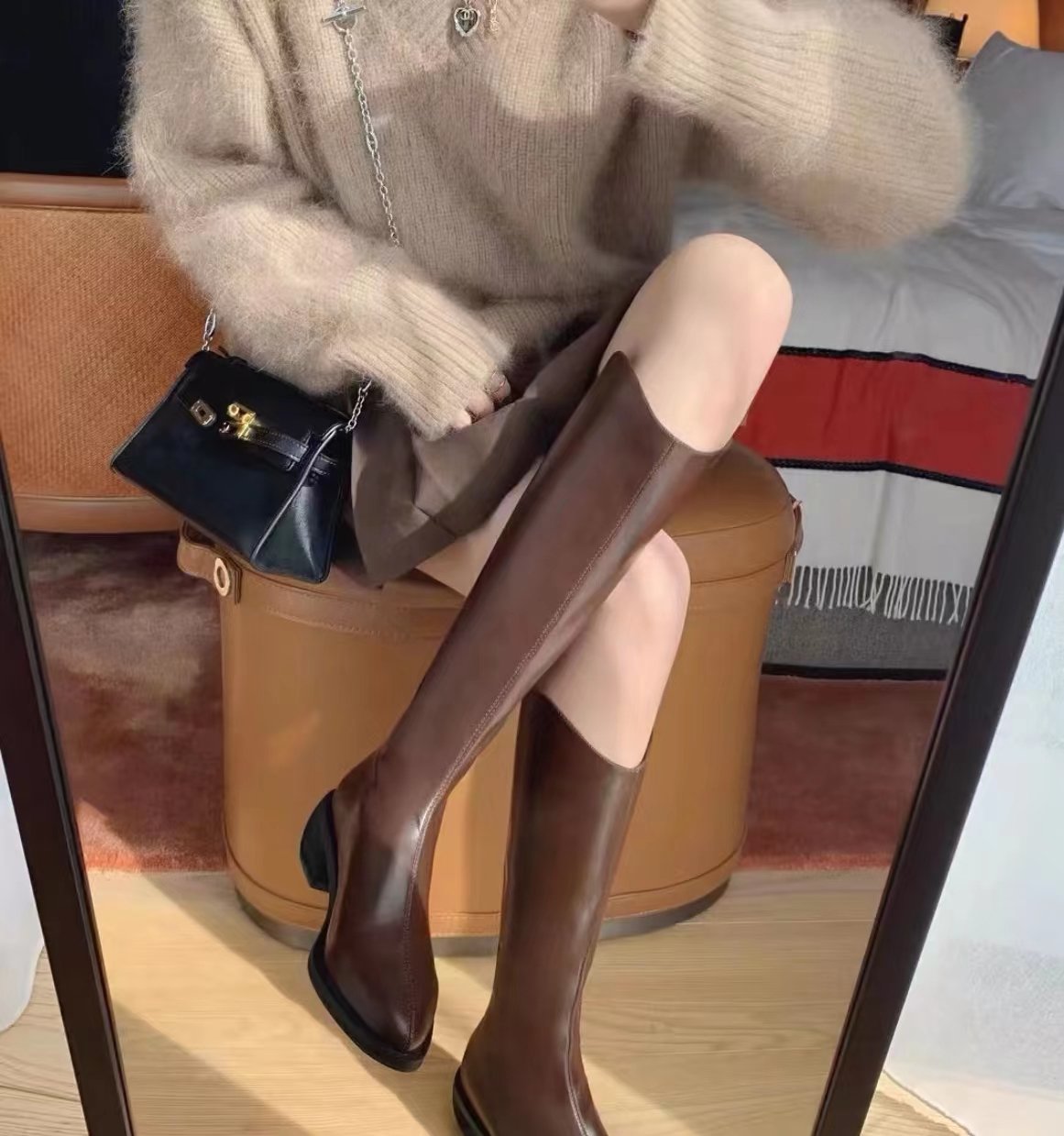Simple high-top boots that go below the knee