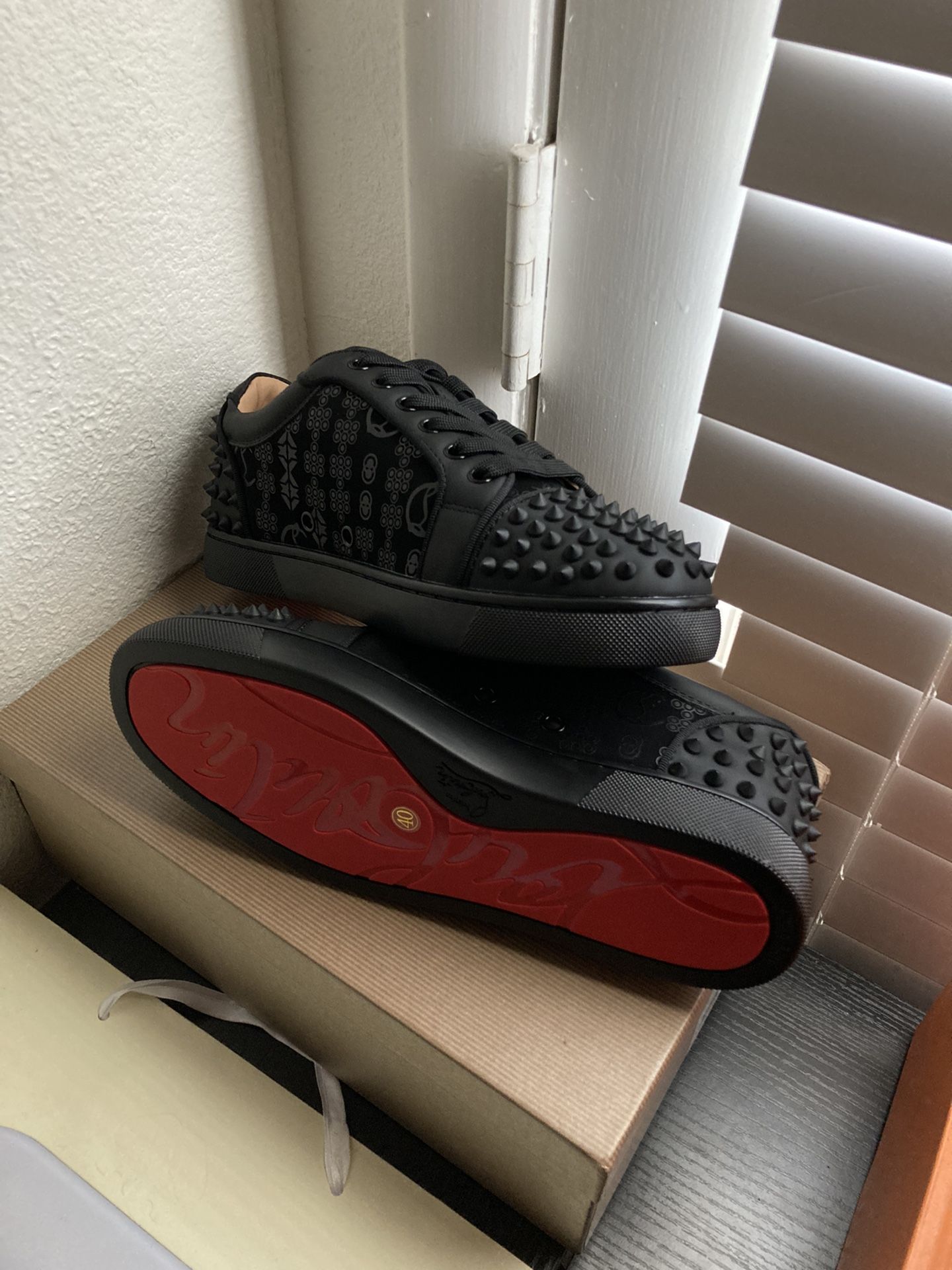 Studded Casual Shoes With A Signature Red Sole