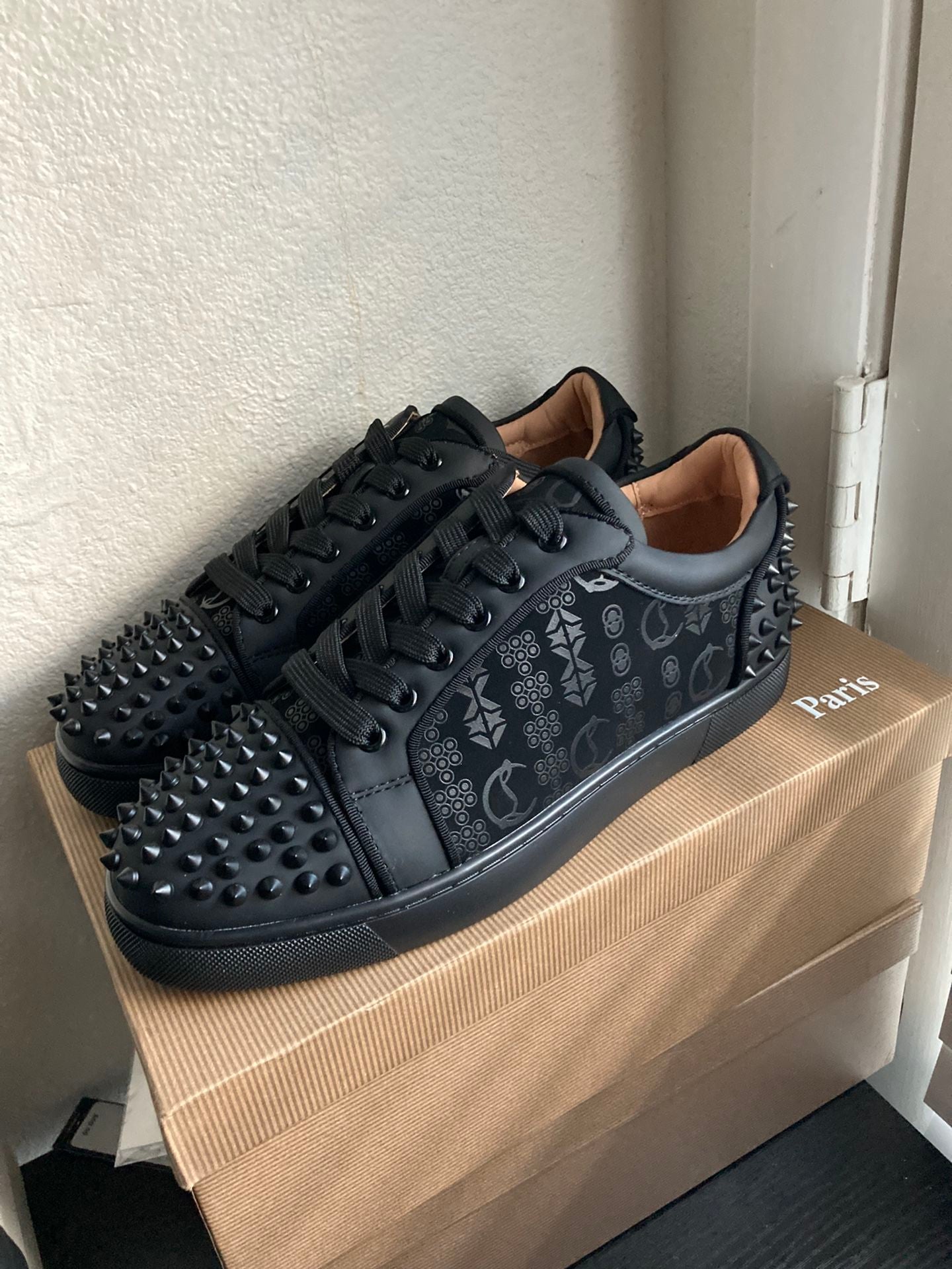 Studded Casual Shoes With A Signature Red Sole