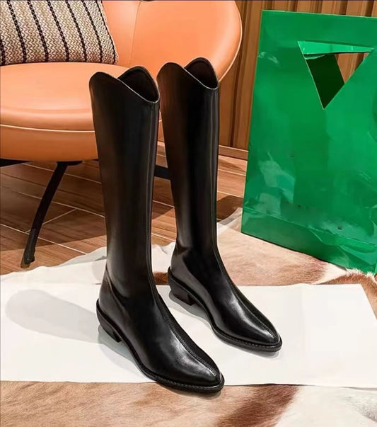 Simple high-top boots that go below the knee